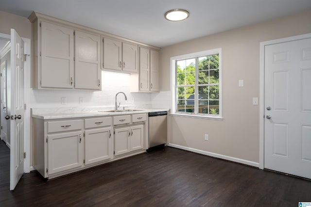 5708 Hickory Ct, Pinson, AL 35126 - kitchen featuring a sink, dishwasher, dark wood-style flooring, light countertops, and baseboards