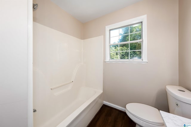 5708 Hickory Ct, Pinson, AL 35126 - full bathroom featuring toilet, wood finished floors, baseboards, and shower / tub combination
