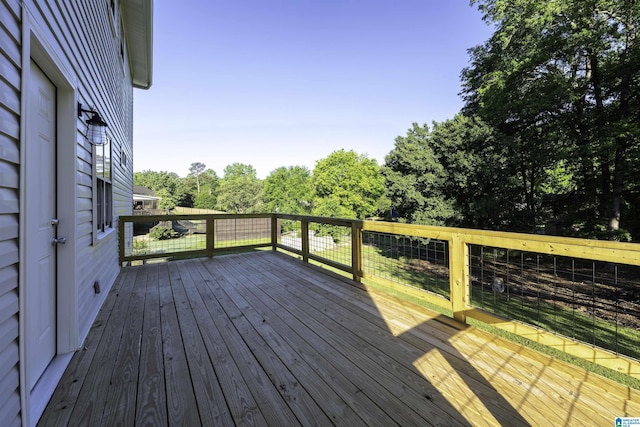 5708 Hickory Ct, Pinson, AL 35126 - wooden deck with view of scattered trees