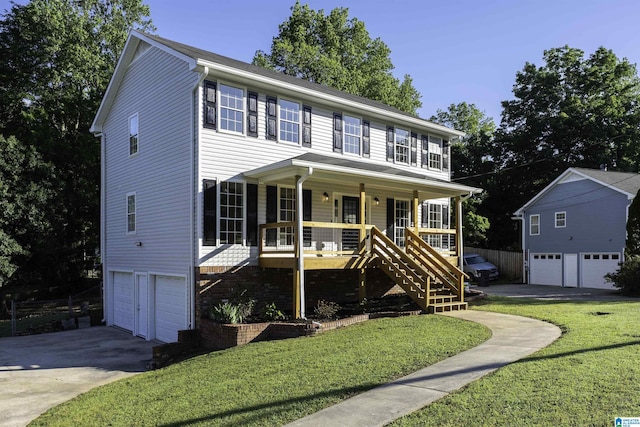 5708 Hickory Ct, Pinson, AL 35126 - colonial home with a garage, covered porch, driveway, stairs, and a front yard
