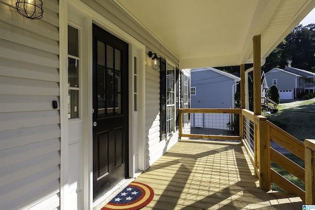 5708 Hickory Ct, Pinson, AL 35126 - wooden terrace featuring covered porch
