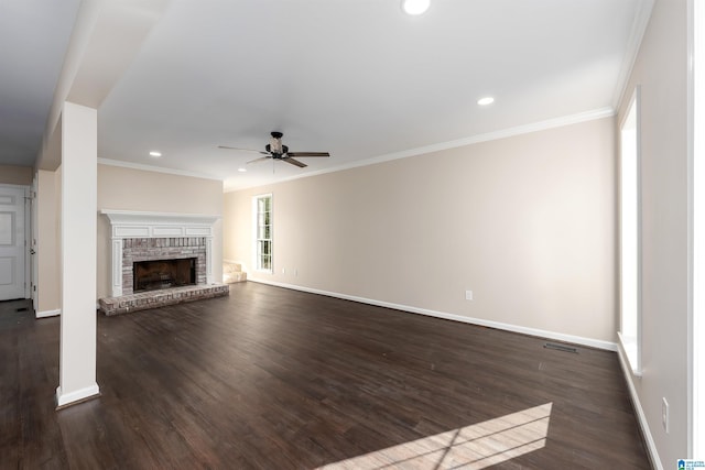 5708 Hickory Ct, Pinson, AL 35126 - unfurnished living room featuring ceiling fan, baseboards, dark wood finished floors, recessed lighting, and a brick fireplace