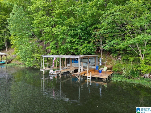 dock area featuring a water view and boat lift