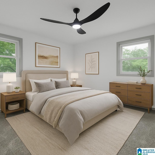 bedroom with ceiling fan and light carpet
