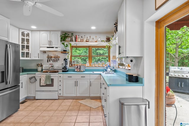 323 Taylor Rd, Remlap, AL 35133 - kitchen featuring white electric stove, stainless steel refrigerator with ice dispenser, under cabinet range hood, white cabinetry, and glass insert cabinets