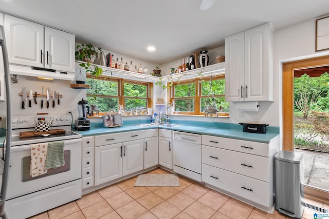 323 Taylor Rd, Remlap, AL 35133 - kitchen with white appliances, a sink, under cabinet range hood, white cabinetry, and recessed lighting