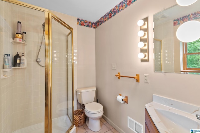 323 Taylor Rd, Remlap, AL 35133 - full bathroom with toilet, a stall shower, tile patterned flooring, vanity, and baseboards