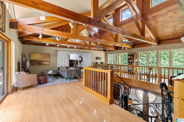 323 Taylor Rd, Remlap, AL 35133 - living area featuring hardwood / wood-style floors, a ceiling fan, beamed ceiling, and high vaulted ceiling