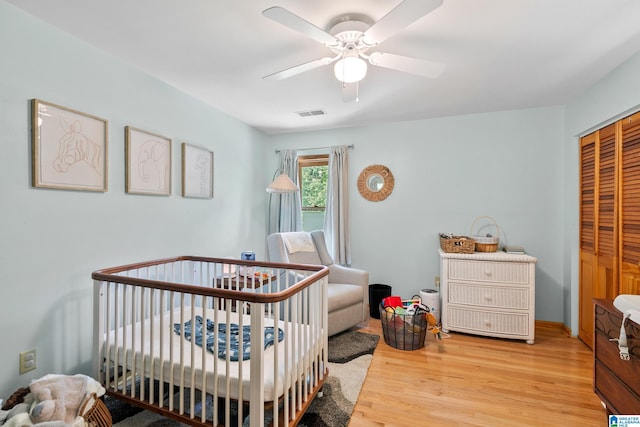 323 Taylor Rd, Remlap, AL 35133 - bedroom featuring light wood-type flooring, a closet, and ceiling fan