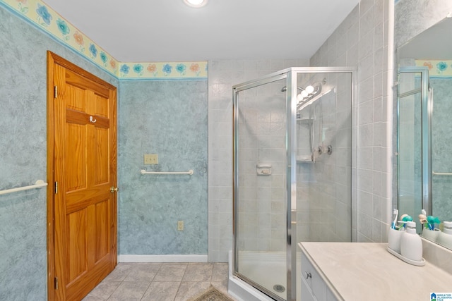 323 Taylor Rd, Remlap, AL 35133 - bathroom featuring a stall shower, tile patterned floors, and vanity