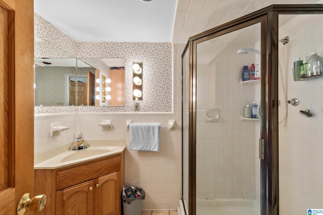 323 Taylor Rd, Remlap, AL 35133 - bathroom with tile walls, a shower stall, vanity, and wallpapered walls