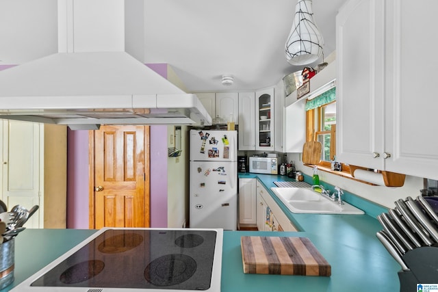 323 Taylor Rd, Remlap, AL 35133 - kitchen with white appliances, island exhaust hood, a sink, and white cabinets