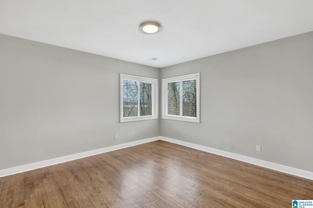 2636 20th Pl, Birmingham, AL 35208 - spare room with baseboards and wood finished floors