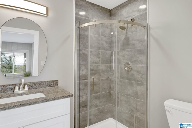 2636 20th Pl, Birmingham, AL 35208 - full bathroom featuring toilet, a shower stall, and vanity
