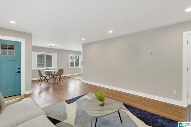 2636 20th Pl, Birmingham, AL 35208 - living room featuring baseboards, recessed lighting, and wood finished floors