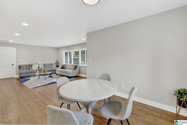 2636 20th Pl, Birmingham, AL 35208 - dining space with baseboards, recessed lighting, and wood finished floors