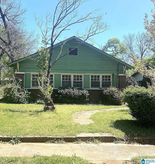 exterior space with a front yard