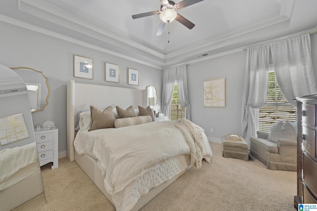 1204 Grants Way, Irondale, AL 35210 - bedroom featuring a tray ceiling, light colored carpet, ornamental molding, baseboards, and ceiling fan