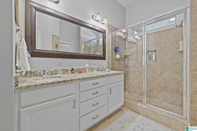 1204 Grants Way, Irondale, AL 35210 - full bathroom with a shower stall, double vanity, and tile patterned flooring