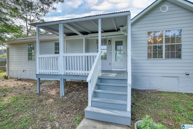 exterior space featuring covered porch and crawl space