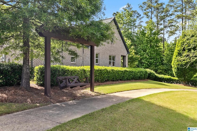 4000 Dunemere Ln, Hoover, AL 35226 - view of property exterior featuring a lawn and brick siding