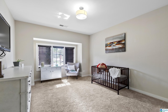 4000 Dunemere Ln, Hoover, AL 35226 - bedroom featuring light carpet and a crib
