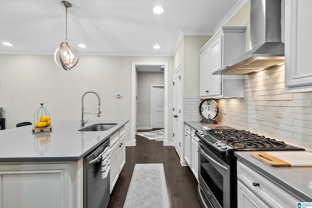 4000 Dunemere Ln, Hoover, AL 35226 - kitchen with appliances with stainless steel finishes, wall chimney range hood, crown molding, decorative backsplash, and recessed lighting