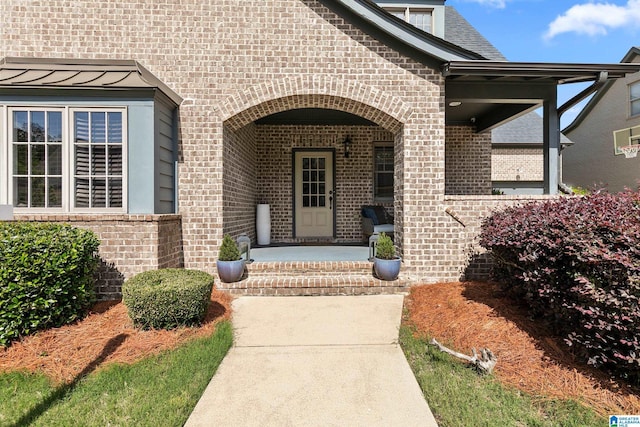 4000 Dunemere Ln, Hoover, AL 35226 - property entrance with brick siding, a standing seam roof, and a porch