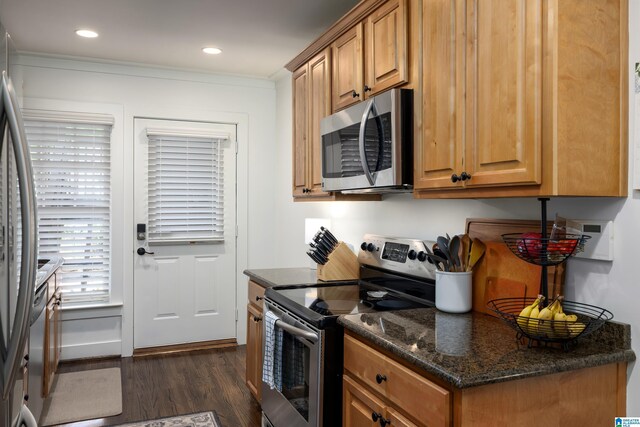1305 31st St S Unit 202, Birmingham, AL 35205 - kitchen with stainless steel appliances, dark wood-style flooring, dark stone countertops, recessed lighting, and brown cabinetry
