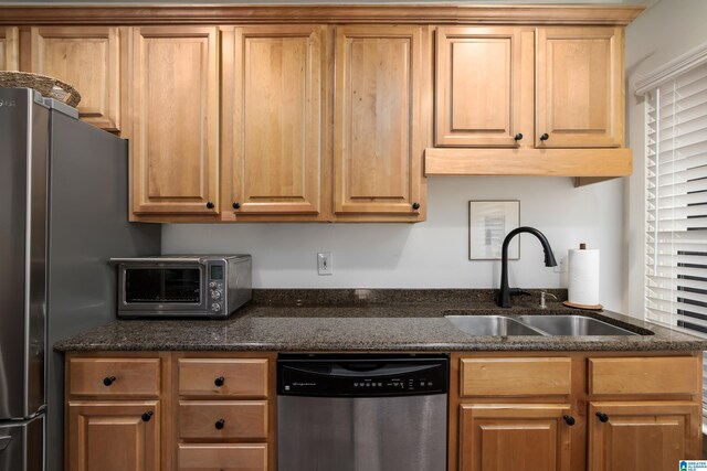 1305 31st St S Unit 202, Birmingham, AL 35205 - kitchen featuring stainless steel appliances, a sink, and dark stone countertops