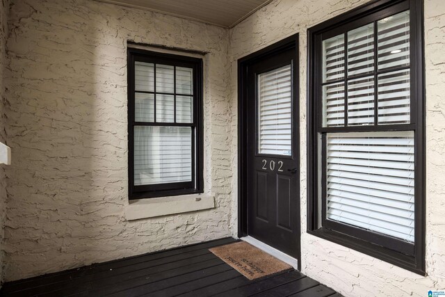 1305 31st St S Unit 202, Birmingham, AL 35205 - property entrance with stucco siding