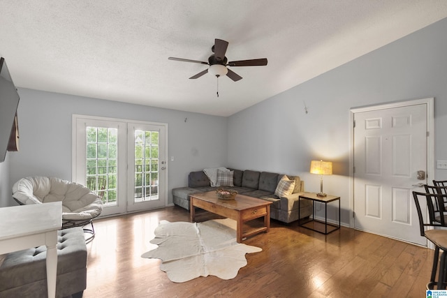 living area featuring ceiling fan and wood finished floors