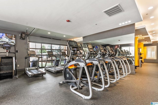 gym with recessed lighting and visible vents