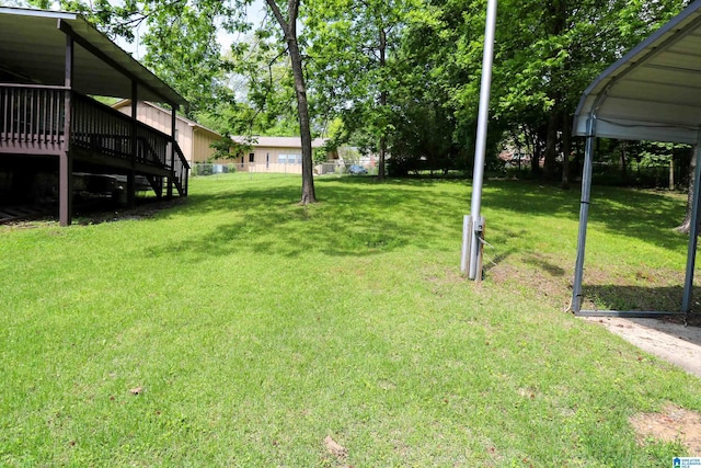 view of yard featuring a deck