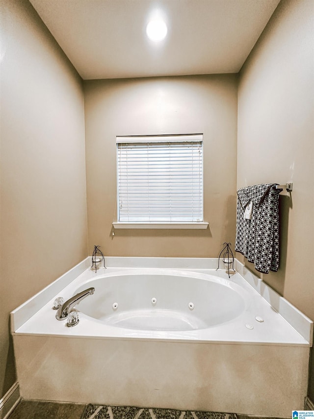 full bath featuring a jetted tub