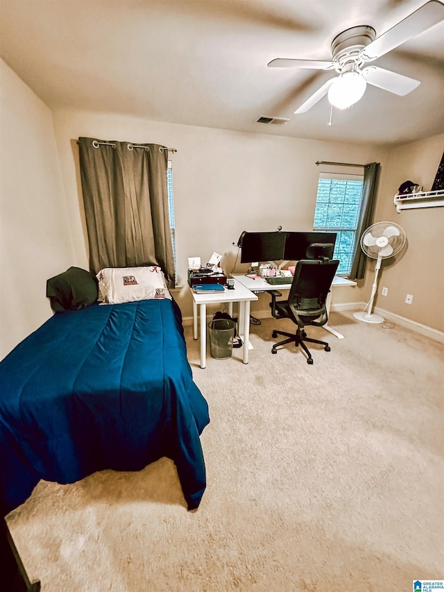 bedroom featuring a desk, carpet floors, ceiling fan, and baseboards