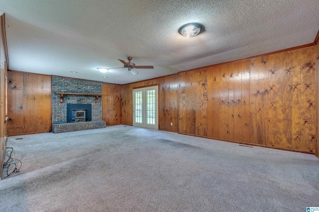 105 Campbell Rd, Clanton, AL 35045 - unfurnished living room featuring carpet, a textured ceiling, and ceiling fan