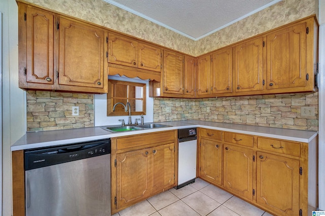 105 Campbell Rd, Clanton, AL 35045 - kitchen featuring light countertops, a sink, brown cabinetry, dishwasher, and ornamental molding