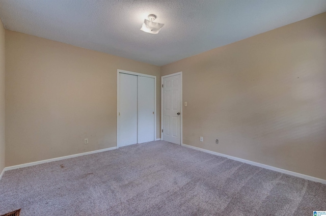 105 Campbell Rd, Clanton, AL 35045 - carpeted spare room featuring a textured ceiling and baseboards