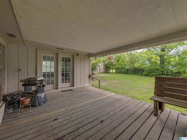 105 Campbell Rd, Clanton, AL 35045 - deck with a lawn, an outdoor structure, visible vents, a fenced backyard, and a shed