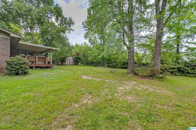 105 Campbell Rd, Clanton, AL 35045 - view of yard featuring a deck