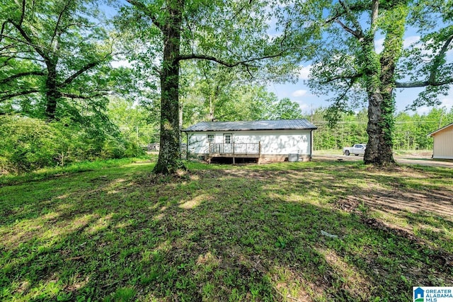 view of yard with a deck