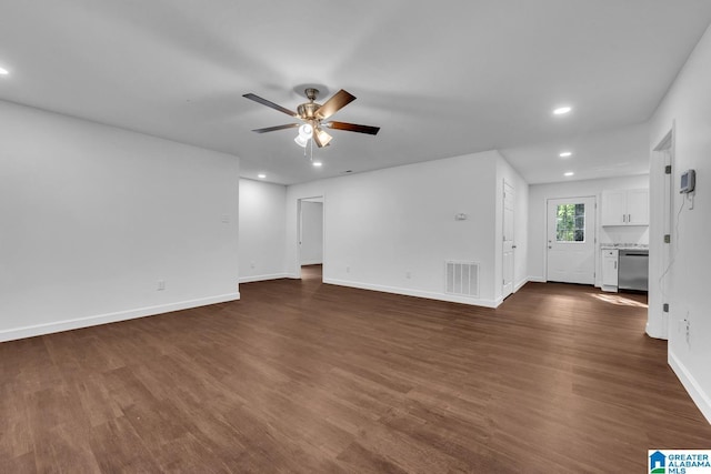 unfurnished living room with recessed lighting, a ceiling fan, dark wood finished floors, and visible vents