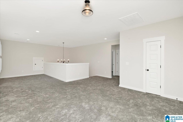 4546 Brexton St, Trussville, AL 35173 - empty room with an inviting chandelier, carpet floors, baseboards, and recessed lighting