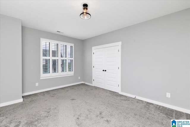 4546 Brexton St, Trussville, AL 35173 - empty room featuring carpet floors, baseboards, and visible vents