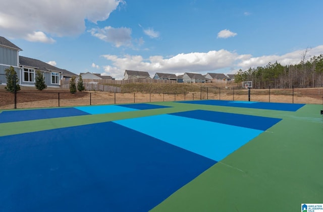 4546 Brexton St, Trussville, AL 35173 - view of sport court featuring fence, basketball court, and a residential view