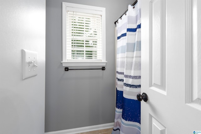 605 N Grande View Cir, Maylene, AL 35114 - full bath featuring baseboards and a shower with shower curtain