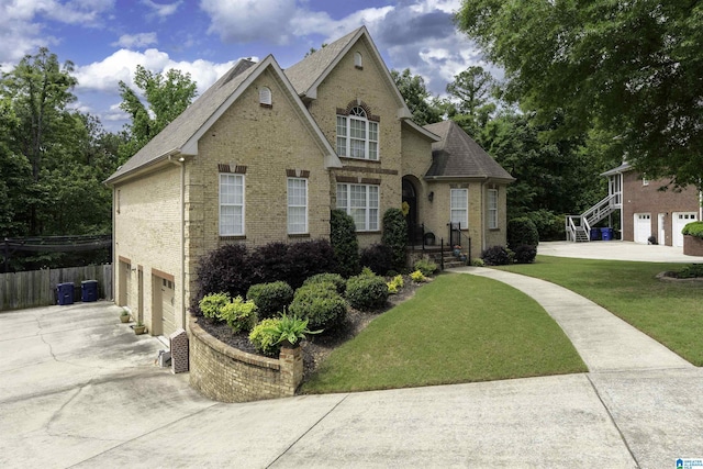 605 N Grande View Cir, Maylene, AL 35114 - view of front of property featuring brick siding, a garage, concrete driveway, and stairway