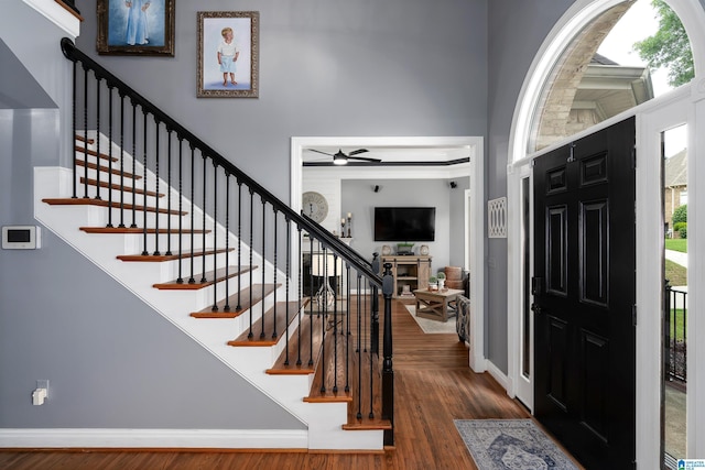 605 N Grande View Cir, Maylene, AL 35114 - entryway with wood finished floors, ceiling fan, stairway, and baseboards