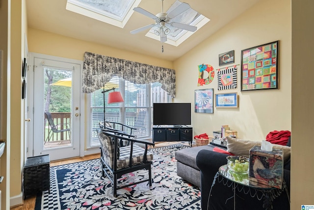 934 Chestnut Oaks Cir, Hoover, AL 35244 - living room with a skylight, wood finished floors, vaulted ceiling, and ceiling fan